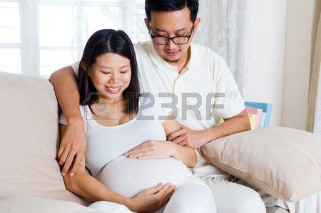 Asian pregnant man