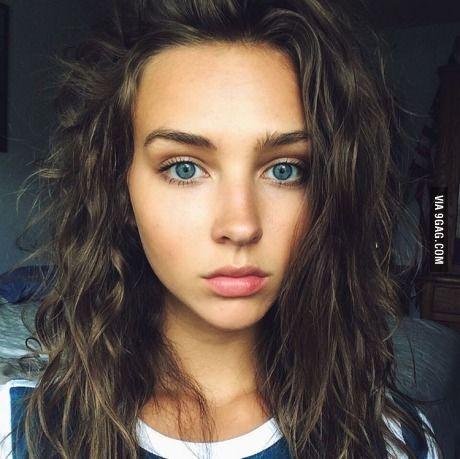 Deep brunette with blue eyes